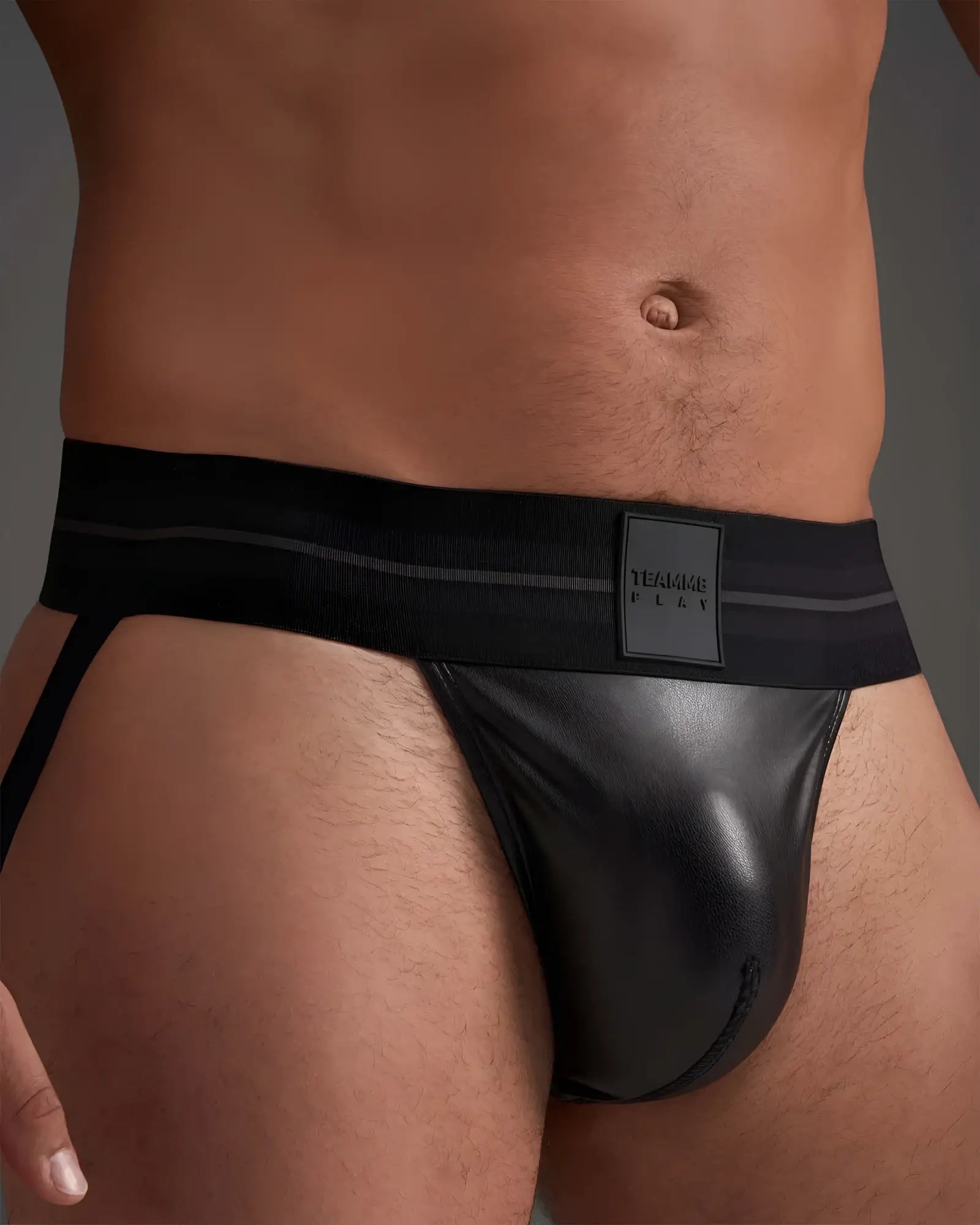 Black leather flex jockstrap briefs with a sleek glossy finish and branded label on the waistband