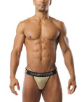 Gold mesh briefs with black waistband and nastypig branding from the flip it jockstrap collection