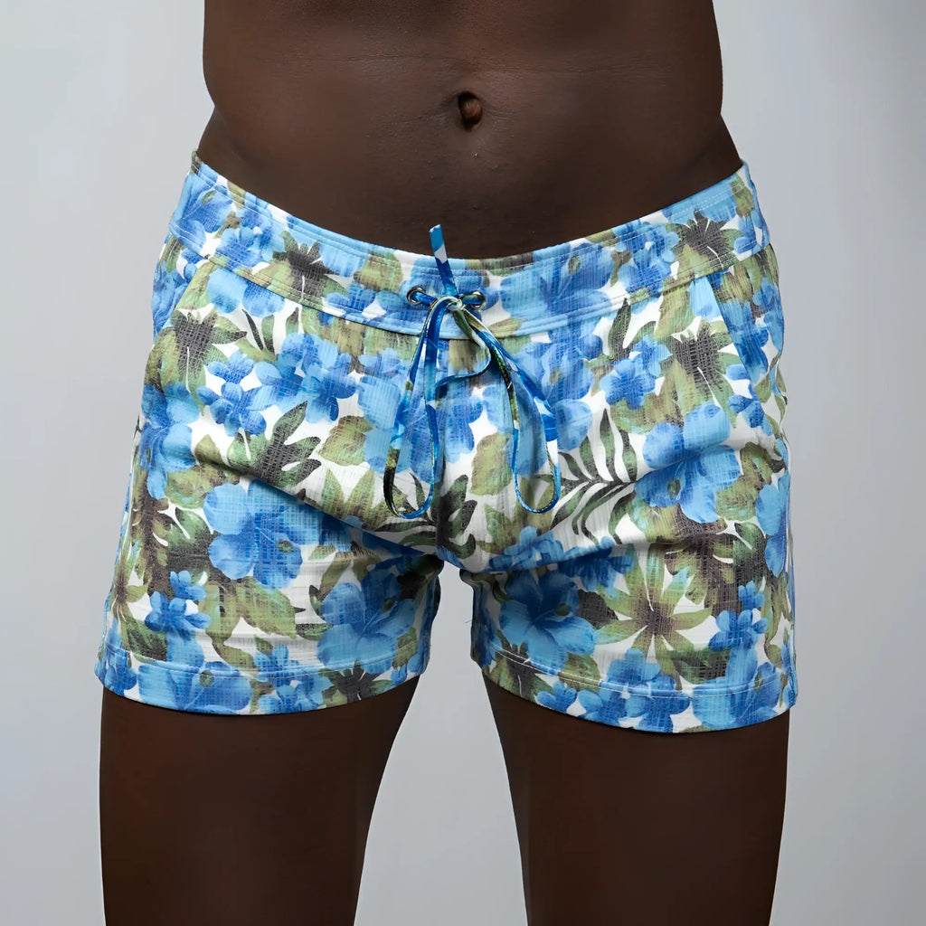 Floral print linen texture shorts in blue and green with a floral pattern and drawstring waistband