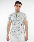White short-sleeved stretch knit shirt with delicate green blue and yellow floral print for casual wear