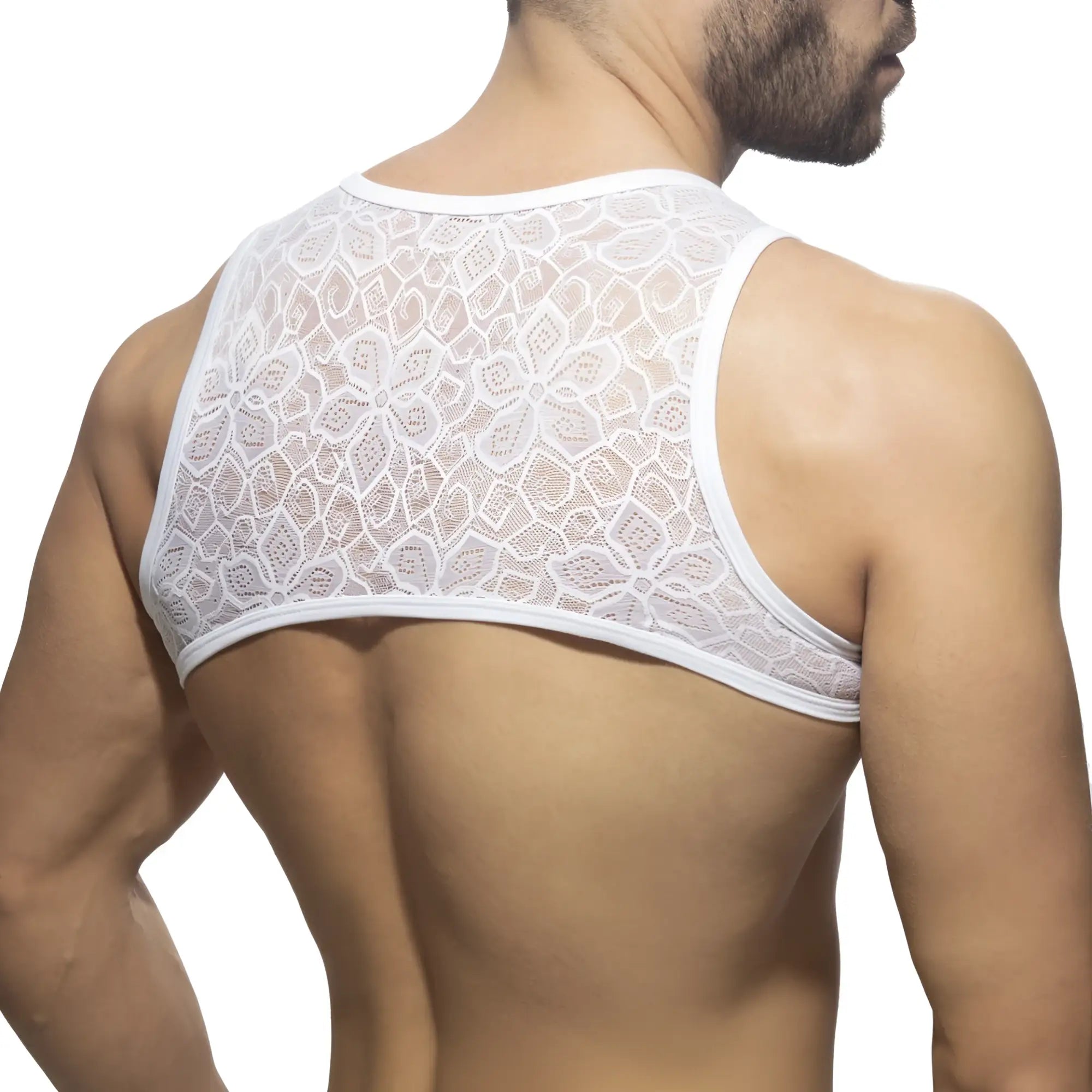 White floral lace harness tank top featuring intricate lace material and delicate floral design for stylish layering
