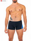 Folsom sq-cut swimsuit featuring black swim trunks with blue side panels and white trim for swim activities