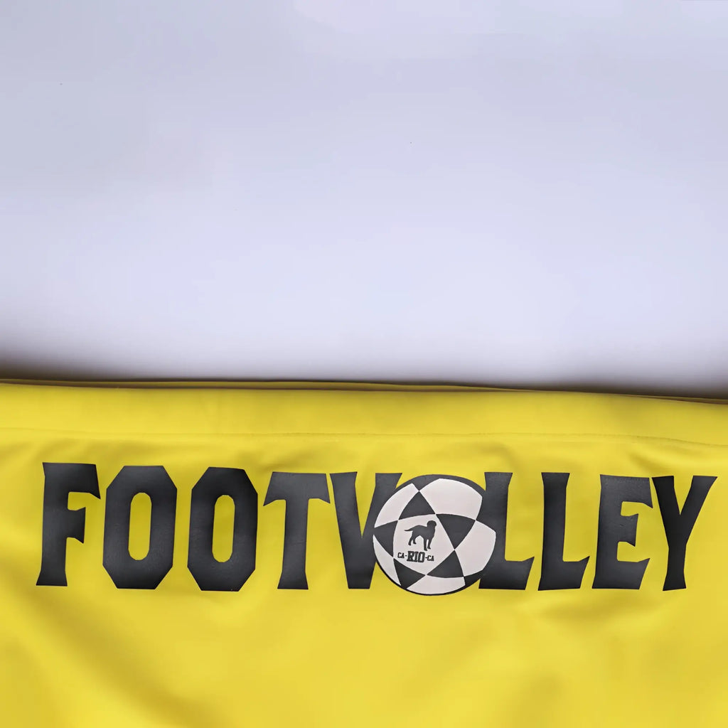 Bright yellow footvolley football jersey with bold black lettering and a dog silhouette soccer ball graphic