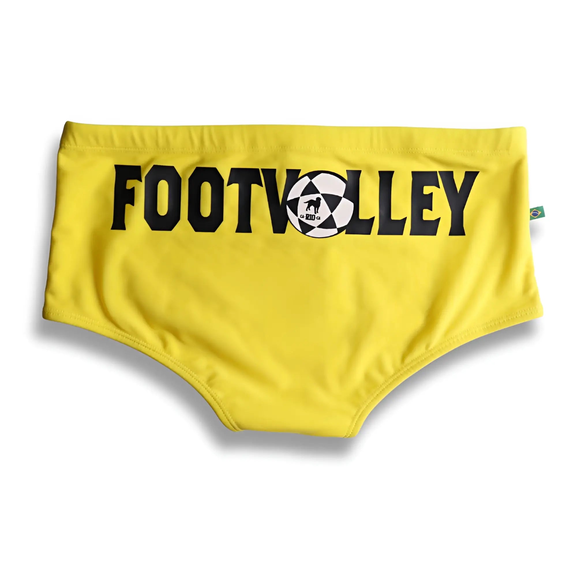 Bright yellow men’s footvolley sunga swim trunks with bold black lettering and soccer ball dog graphic in traditional cut