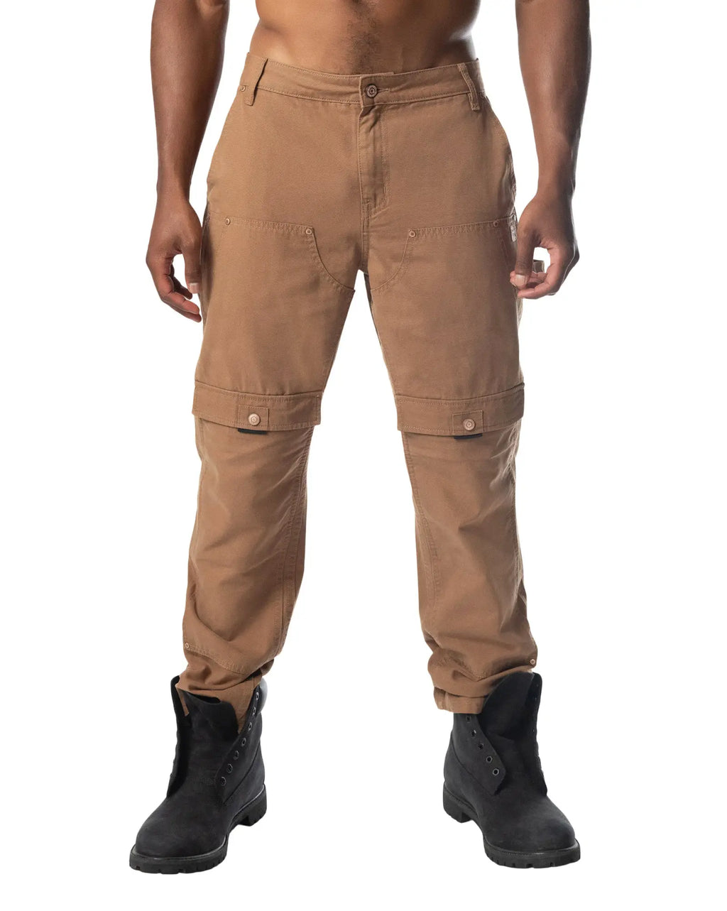 Tan forge pant cargo pants with multiple pockets and buttoned flap details for durable outdoor wear