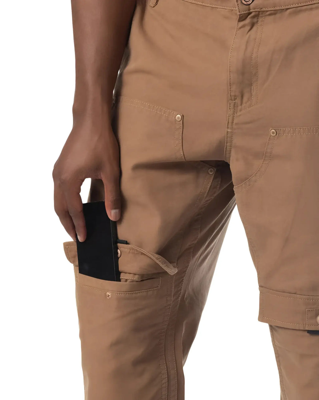 Tan forge pant cargo pants with multiple pockets and button closures designed for durable everyday wear