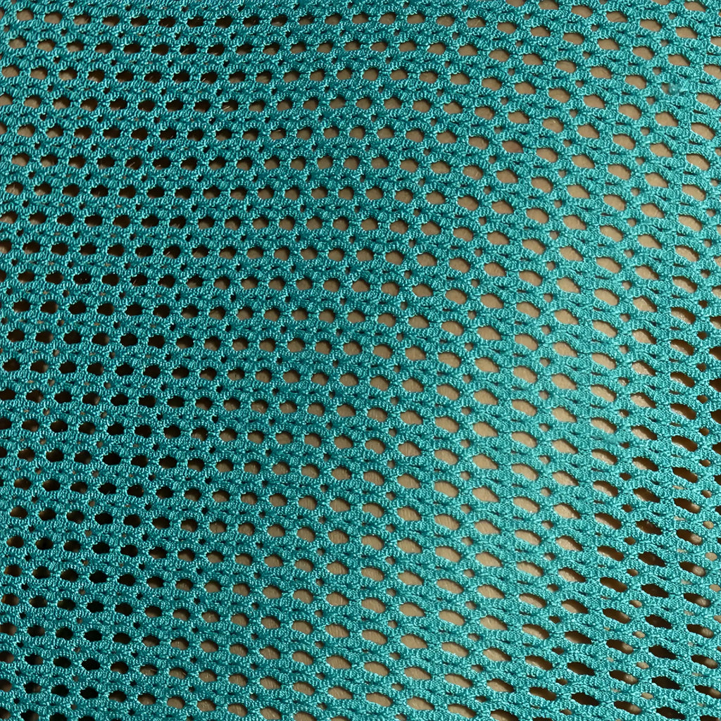 Teal crocheted mesh fabric with oval holes on the back of the Formentera Retro Tank Top