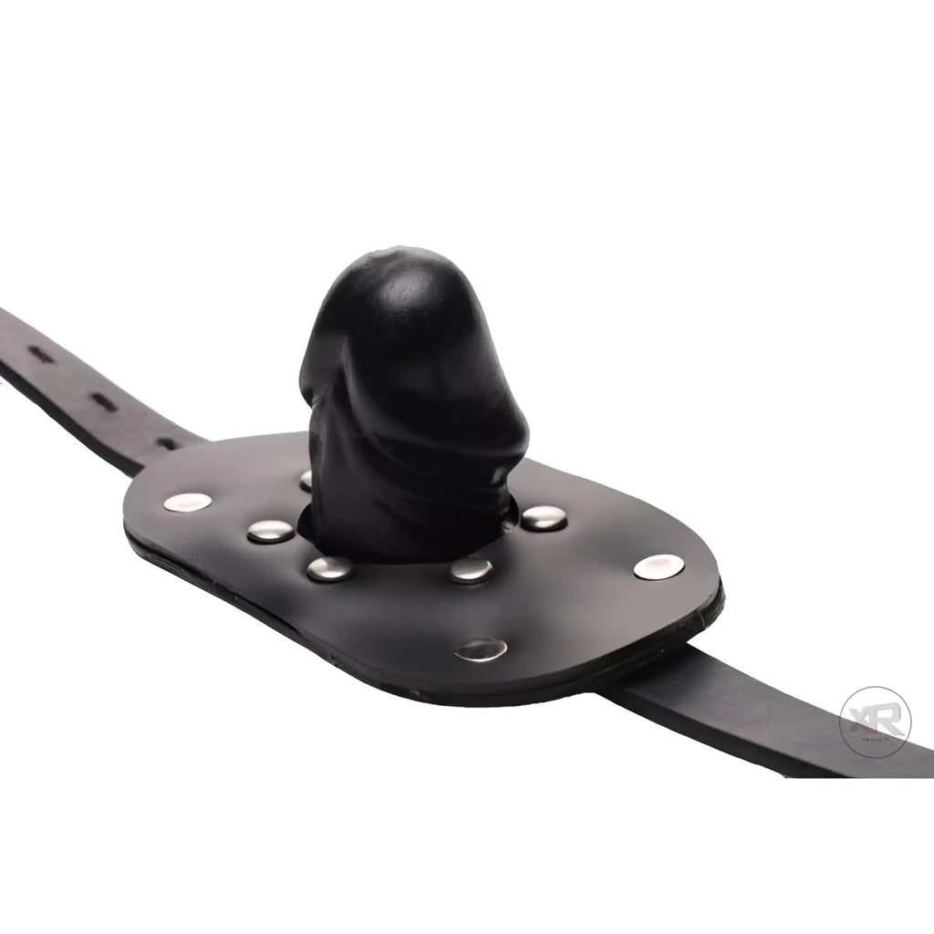 Frisky Beginner Locking Penis Gag: Black phallic-shaped gag mounted on a buckled leather strap with silver rivets.