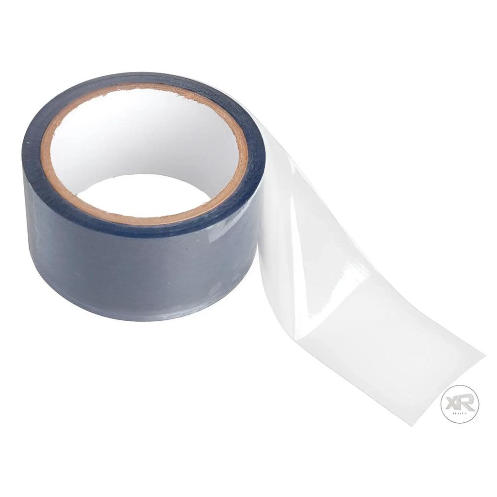 Frisky Clear Bondage Tape: A roll of translucent, adhesive tape partially unspooled against a white background.