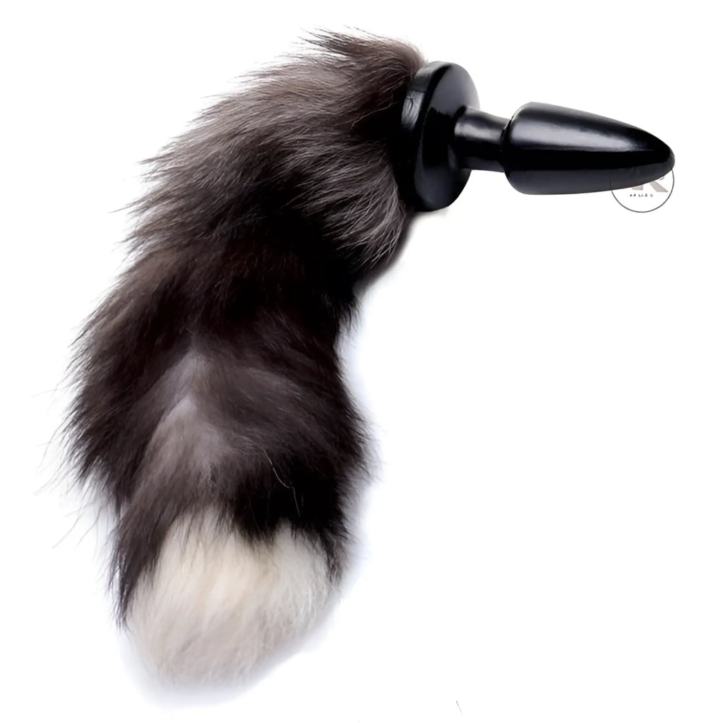 Frisky Fox Tail butt plug featuring a smooth black base attached to a fluffy, grey and black faux fur tail with white tip.