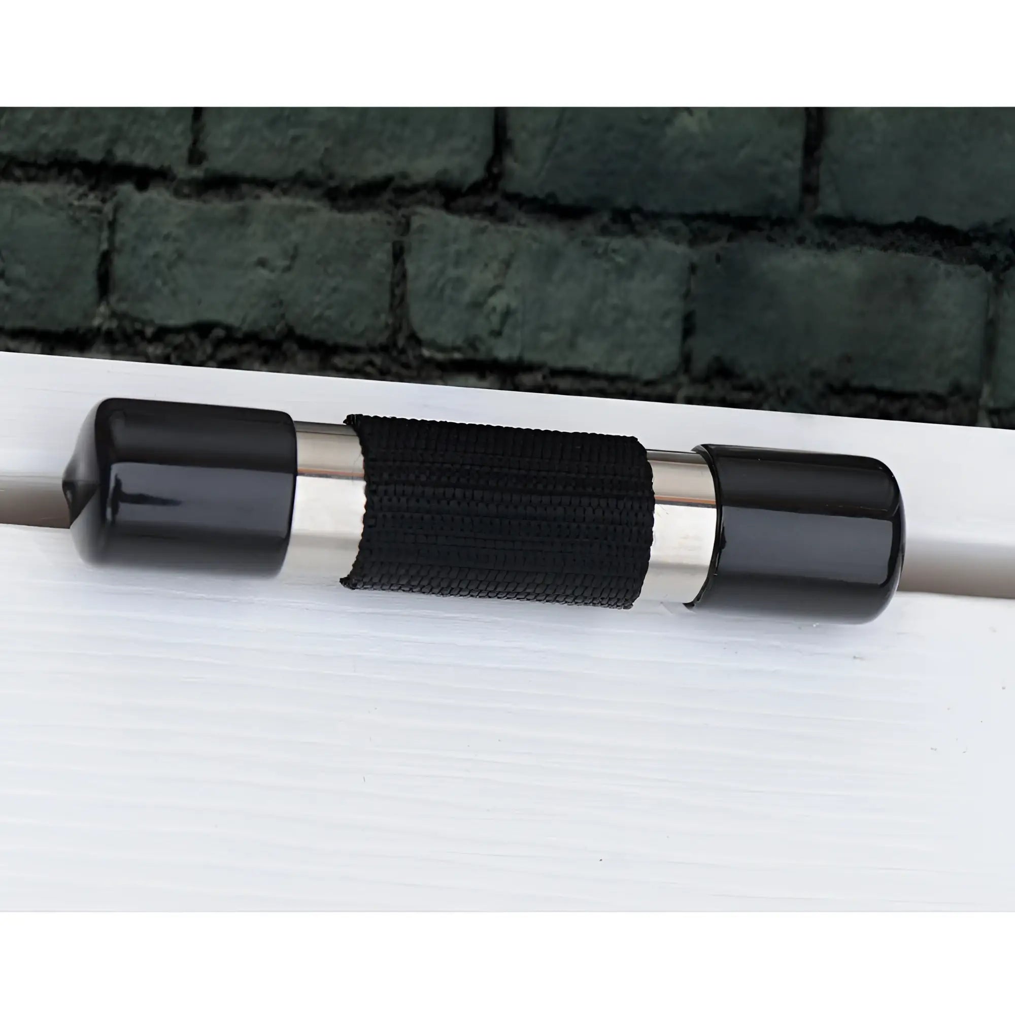 Frisky Over the Door Entryway Restraints featuring a silver metal bar with black capped ends and a textured center grip.