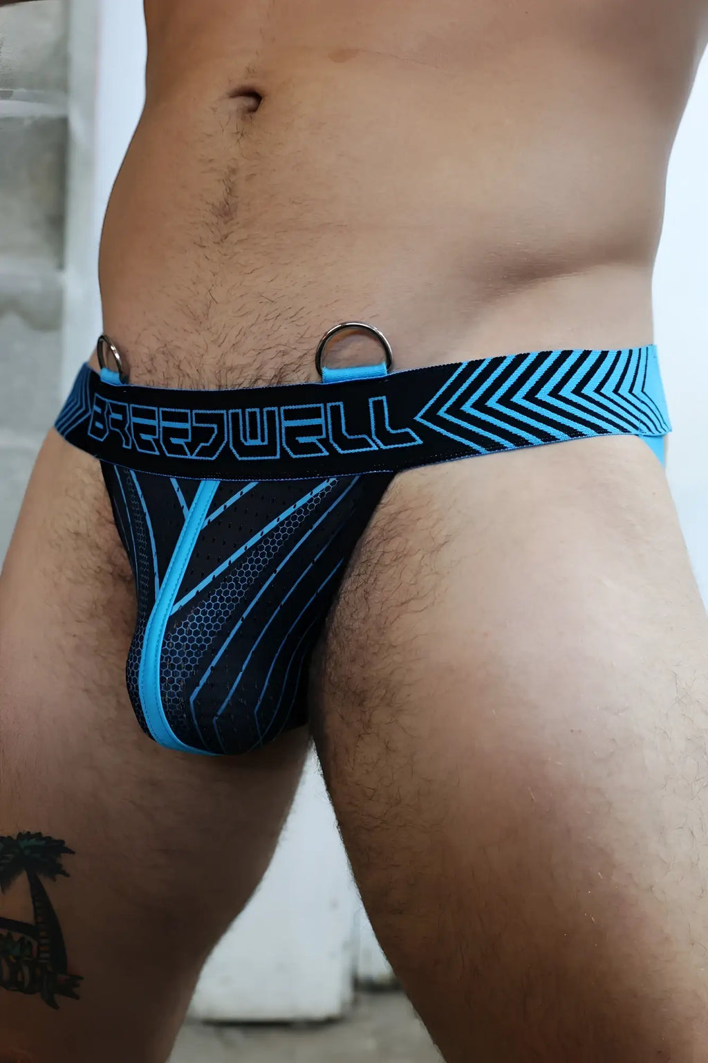 Blue and black patterned freedwell futura jockstrap with mesh detailing for support and breathability