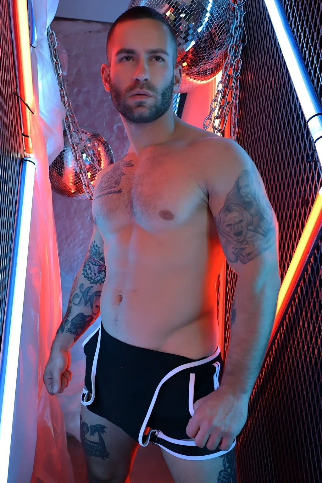 Black athletic briefs futura sluterall with white piping and silver buckle designed for active wear