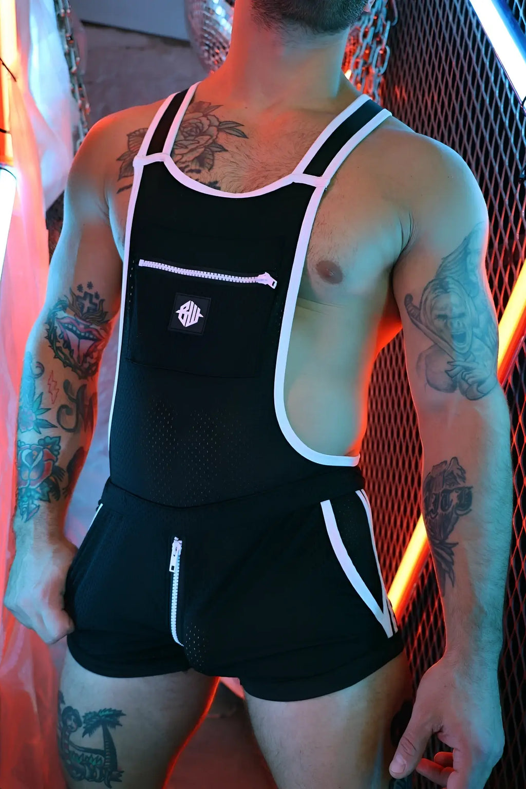 Futura Sluterall black mesh and fabric overalls with white piping front zipper pocket and side zippers