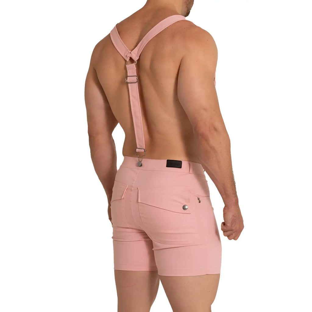 Pink suspenders with adjustable straps and metal clasps paired with matching pink shorts from gigo aventurer pink short collection