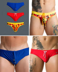 Trio of men's swim briefs in blue, red, and tropical print, featuring elastic waistbands and drawstring cords.