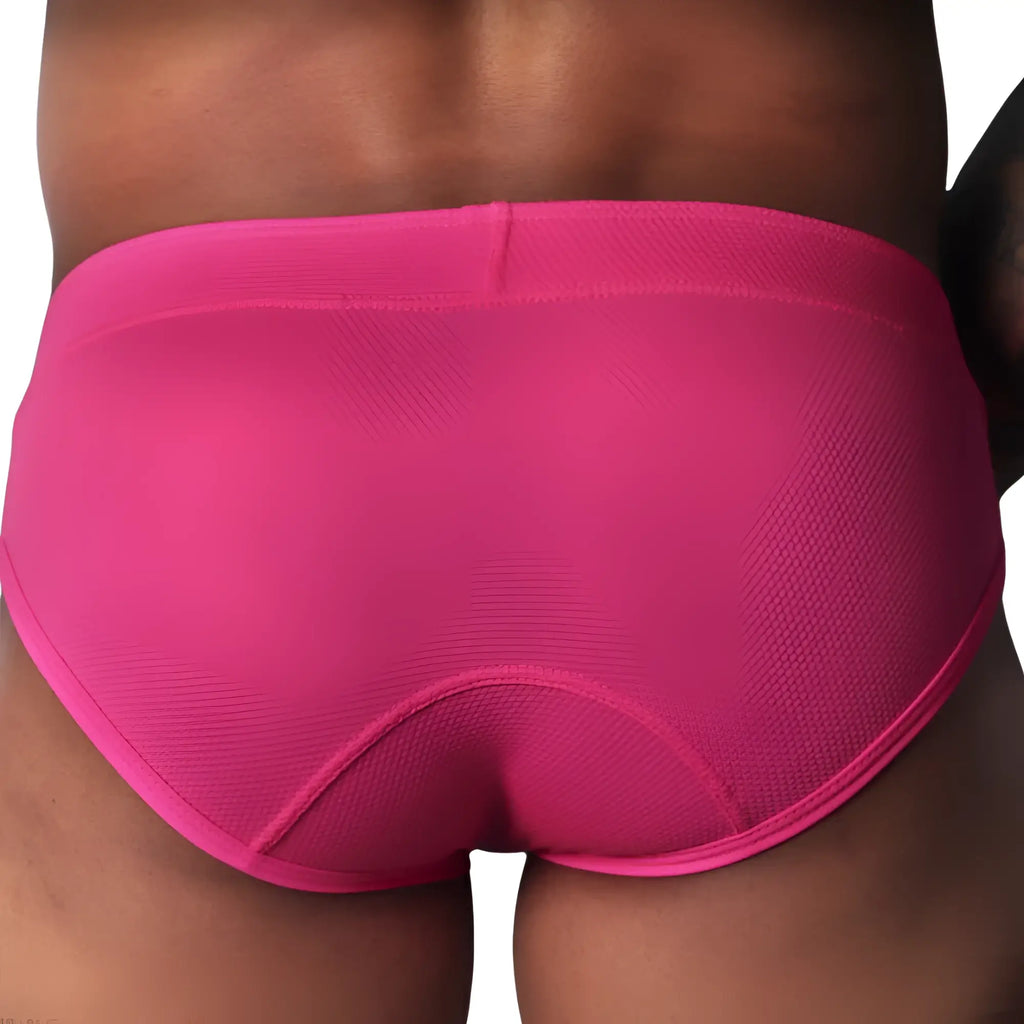 Fuchsia-colored briefs in a textured, honeycomb-patterned fabric with a contoured back seam.