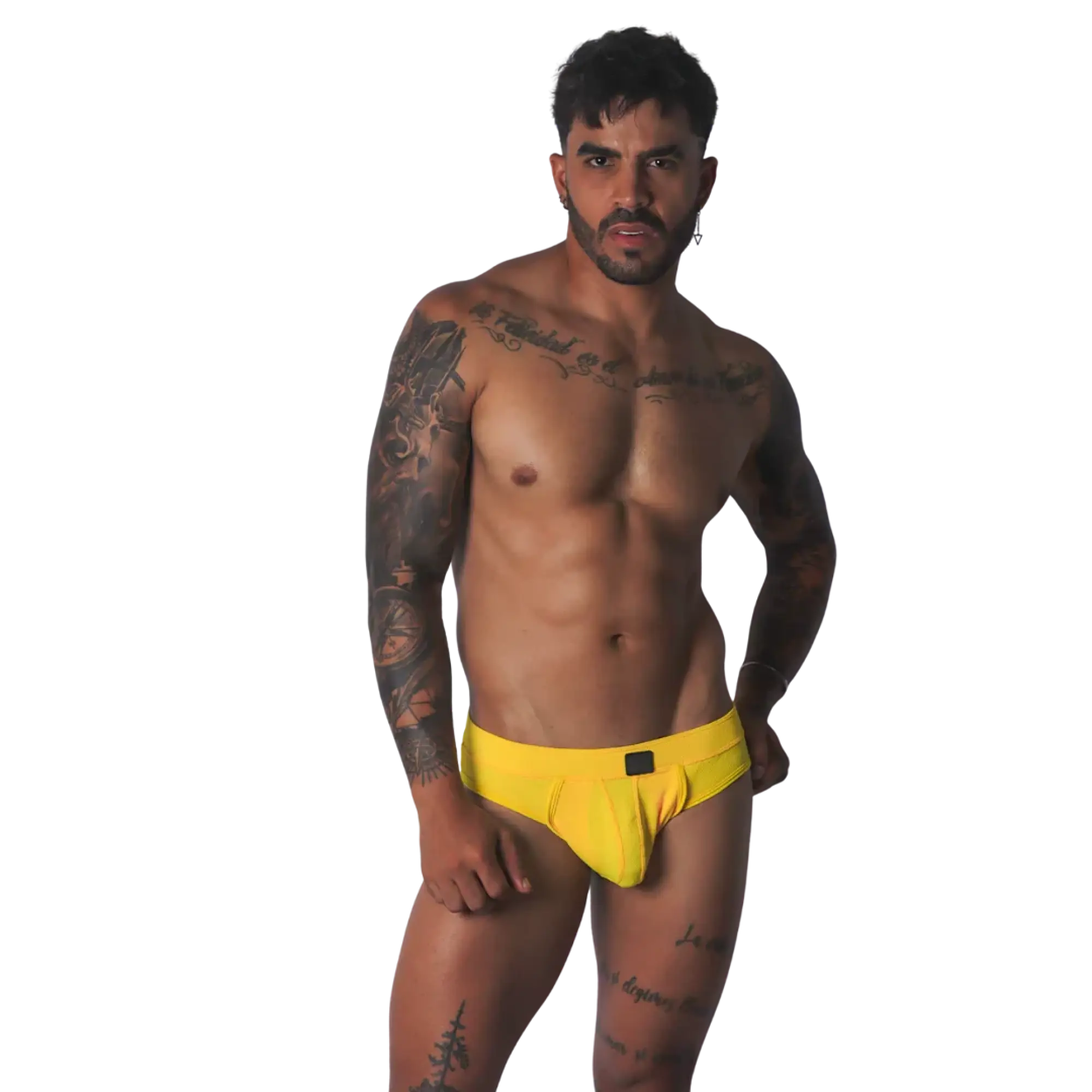 Yellow textured fabric jockstrap with a central black tab detail on the waistband, worn by a tattooed man.