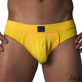 Bright yellow athletic mesh jockstrap with a wide waistband and a center black Gigo logo patch.