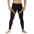 Black gigo core leggings with bold yellow diagonal stripes on outer thighs for athletic performance