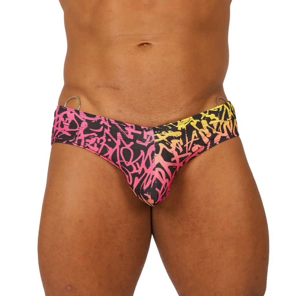 Gigo Crazy swimbrief vibrant pink and yellow graffiti-patterned swim trunks with black base for swimwear use