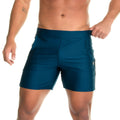 Teal gigo energetic green high-waisted athletic shorts with side pockets and subtle thigh logo for active wear