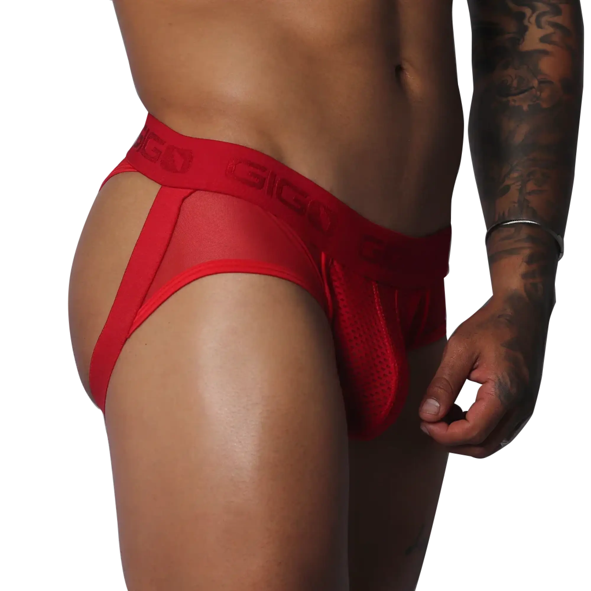 Red jockstrap thong featuring sheer mesh fabric, a pouch, and a branded elastic waistband on a muscular torso.
