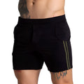 Black textured athletic shorts with olive green side stripes from Gigo F Fetish Green Short collection