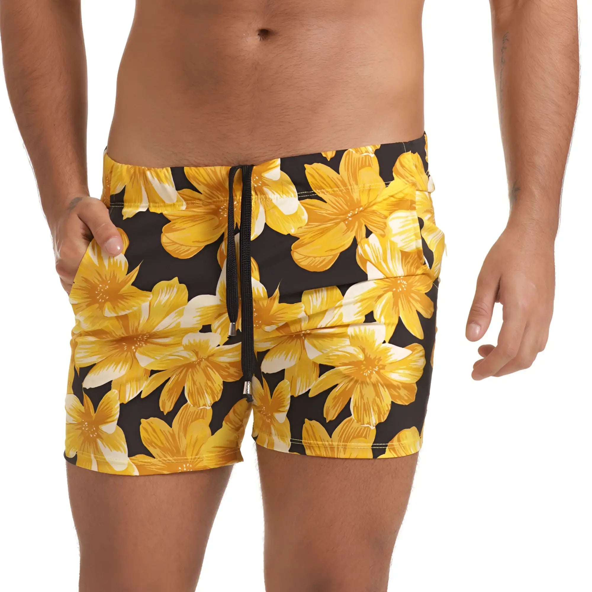 Black swim trunks with vibrant yellow and white floral pattern and drawstring waistband from Gigo Flowers Yellow Beachwear