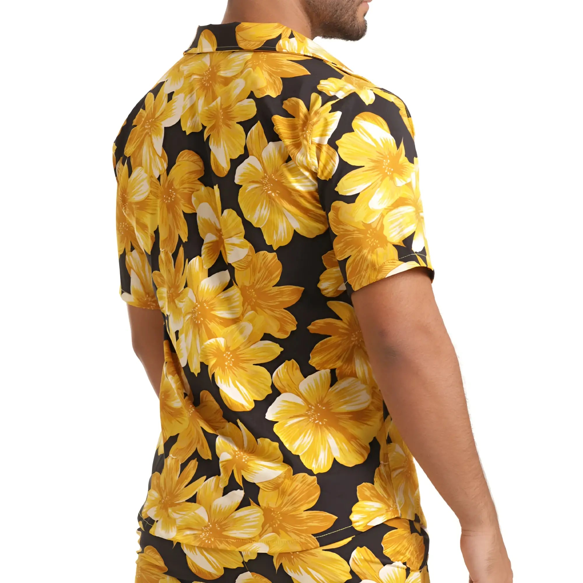Gigo Flowers yellow shirt with vibrant yellow floral print short sleeves on black background with bold gold and white blossoms