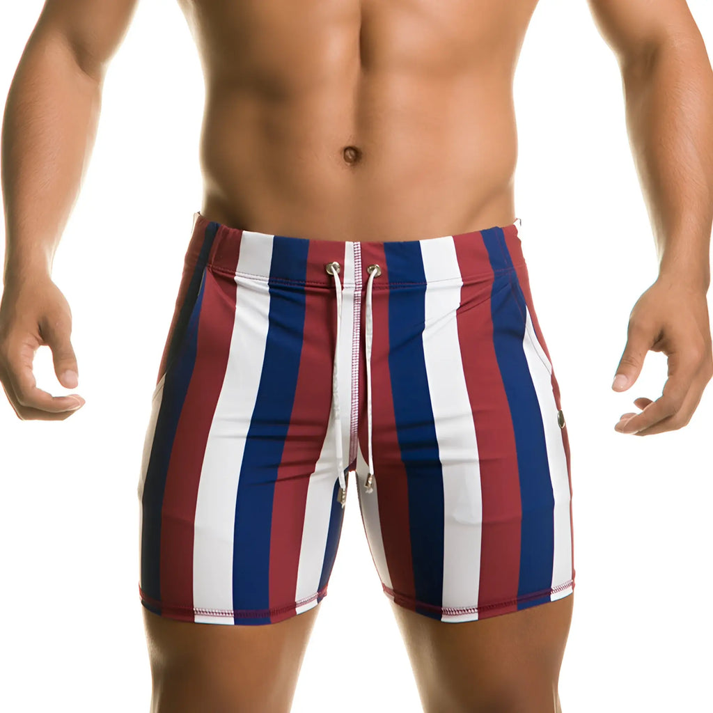 Men’s Gigo Line Beachwear swim trunks with red white and blue vertical stripes and a drawstring waistband