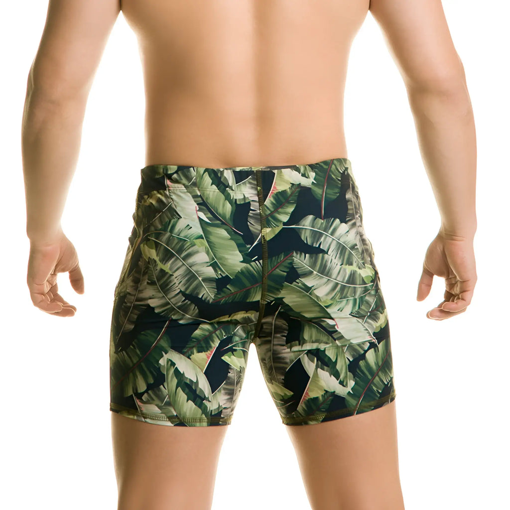 Men’s gigo plantation beachwear tropical leaf-patterned swim trunks in dark and light green with snug fit and seams