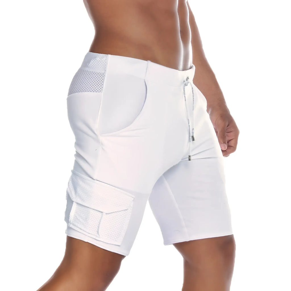 White athletic shorts with mesh panels and cargo pockets designed for comfort and utility in gigo pocket white short