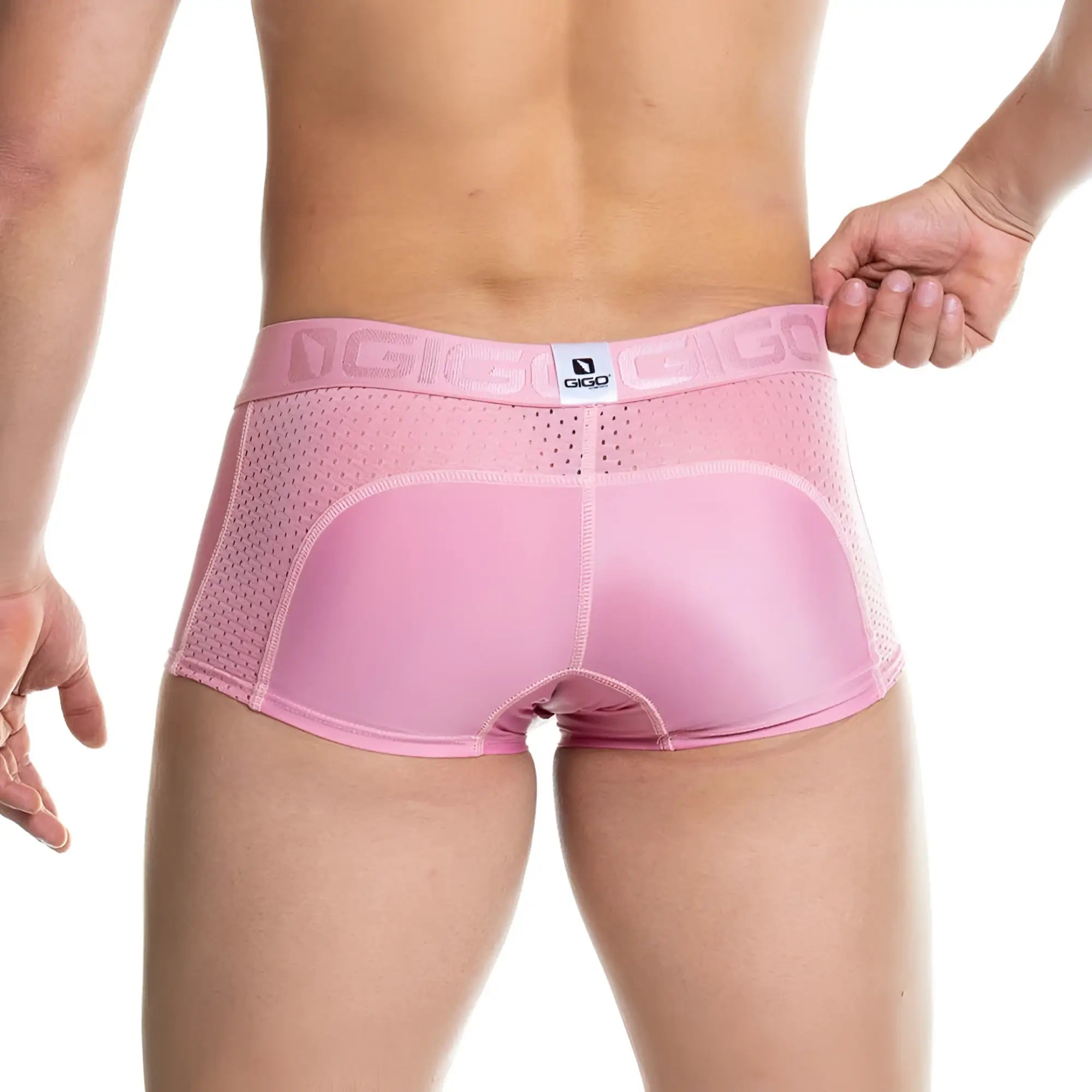Pink gigi brand men’s briefs with a mesh back and solid nude front panel gigo prudence nude trunk