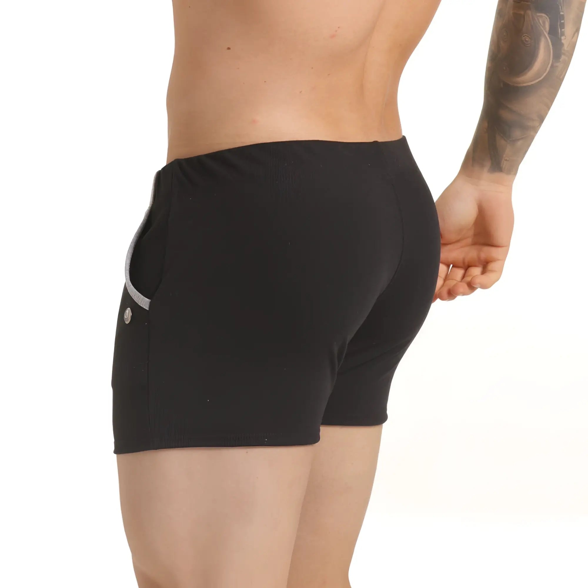 Gigo Scanaling black athletic shorts with subtle textured fabric and sleek silver zipper on side pocket