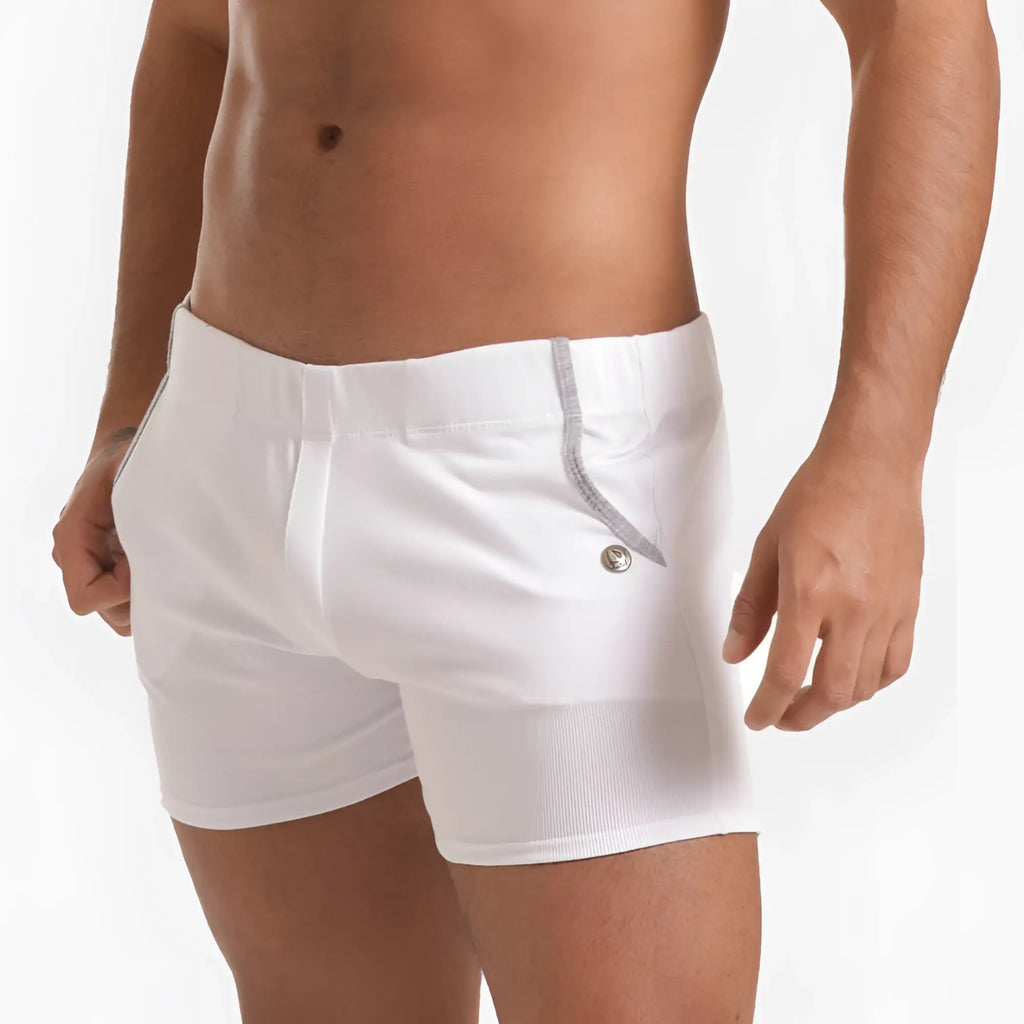 White men’s swim trunks gigo scanaling with subtle ribbed texture and silver zipper detail