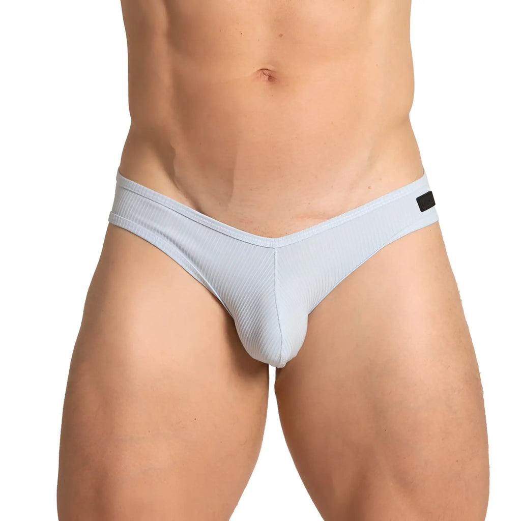 Light blue ribbed men’s briefs made from soft fabric with a black tag on the waistband gigo soft blue brief