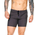 Navy blue Gigo Sultan black beachwear swim trunks with yellow and white vertical stripes and a drawstring waistband