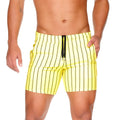 Bright yellow Gigo Sultan swim trunks with bold black vertical stripes and a matching drawstring waistband for beachwear