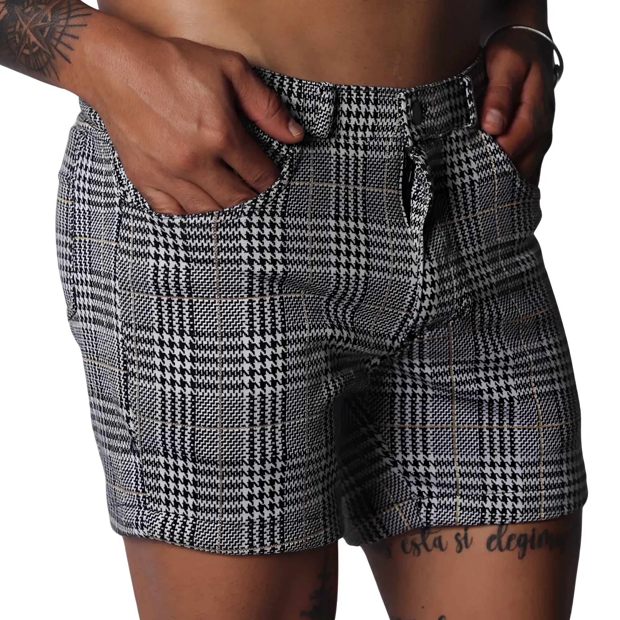 Men's slim-fit shorts in a black and white houndstooth glen plaid pattern with subtle gold thread accents.