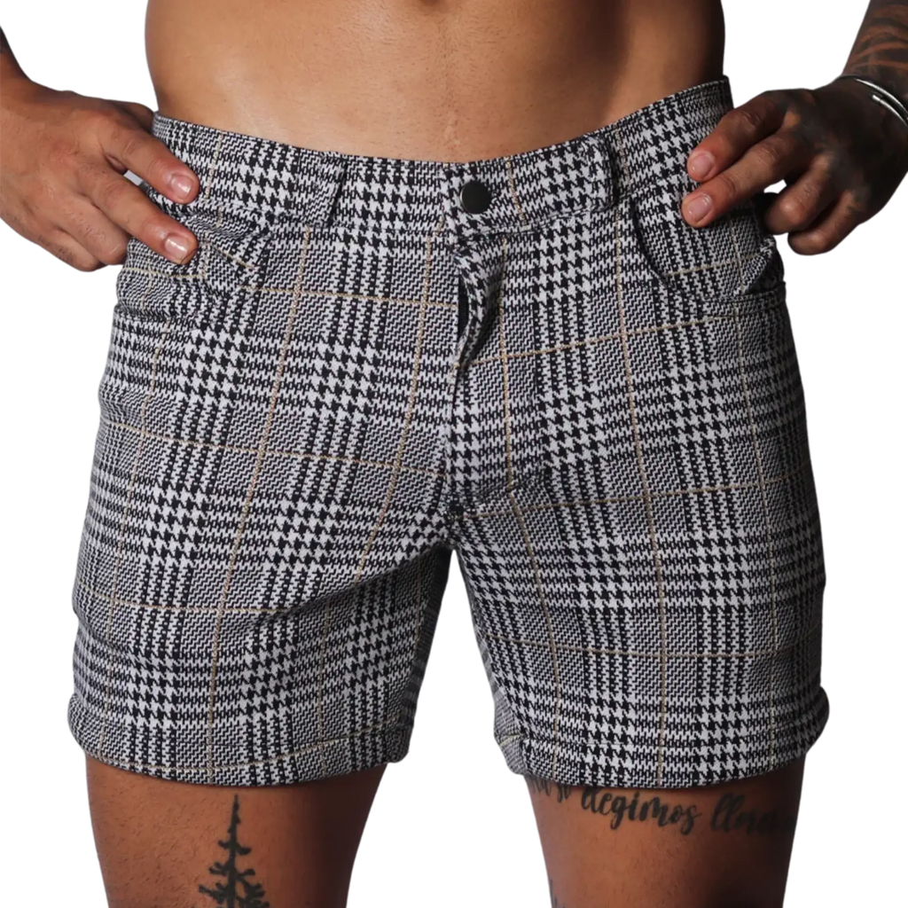 Black and white houndstooth print shorts with a subtle gold windowpane check, featuring a classic five-pocket design.