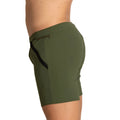 Olive green gigo tennis shorts with black zipper side pocket detail designed for athletic use