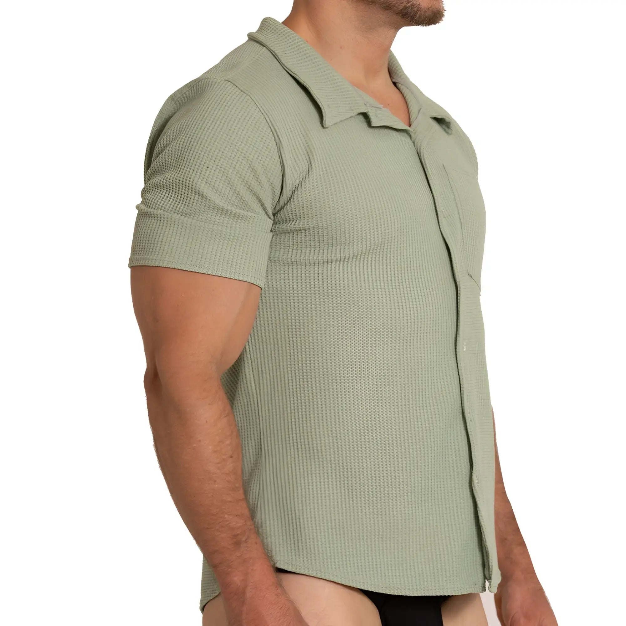 A men’s short-sleeved polo shirt in muted sage green with textured waffle knit and classic collar gigo tissue green shirt