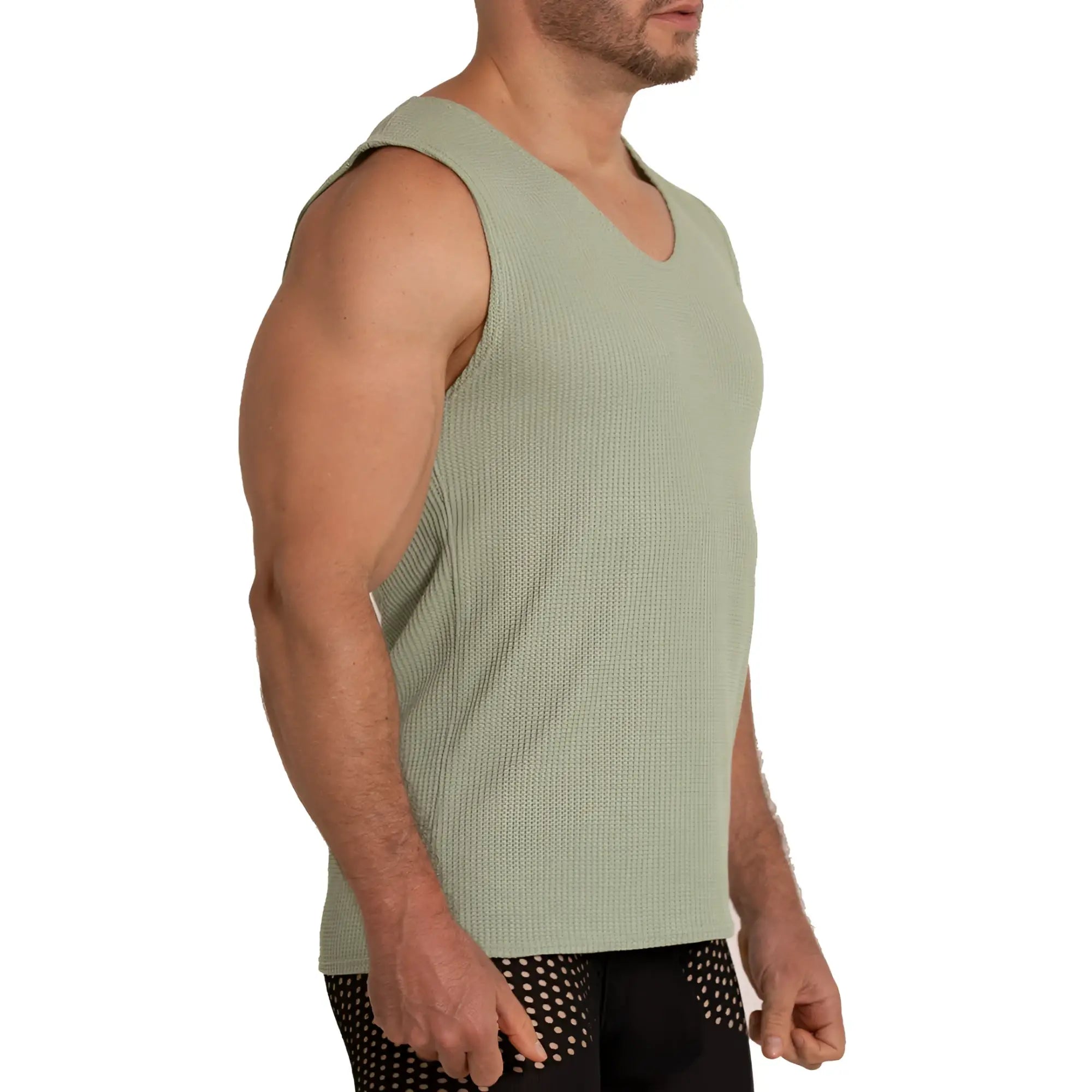A men’s sage green ribbed knit sleeveless tank top with v-neckline from Gigo Tissue Green Tank collection