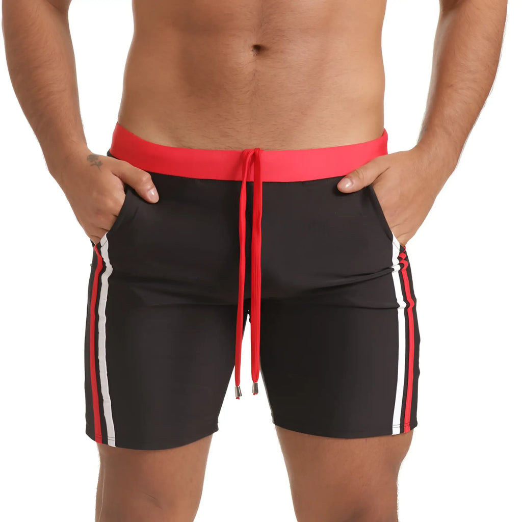 Gigo Versatil red beachwear black swim trunks with vibrant red waistband drawstring and bold white side stripes
