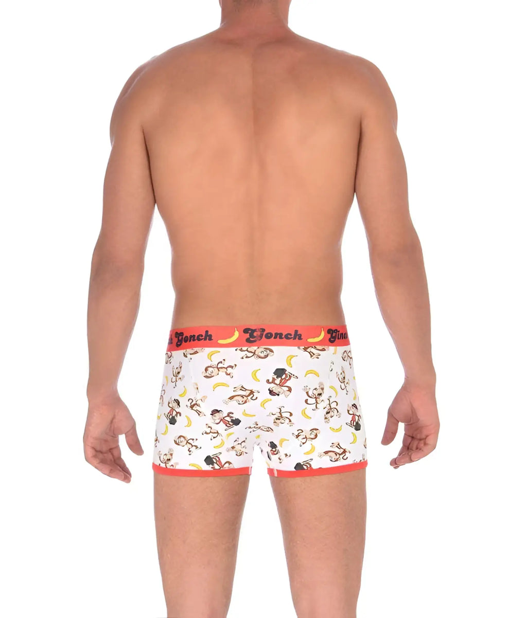 White boxer briefs with playful monkey and banana pattern and bold orange trim by french in size medium