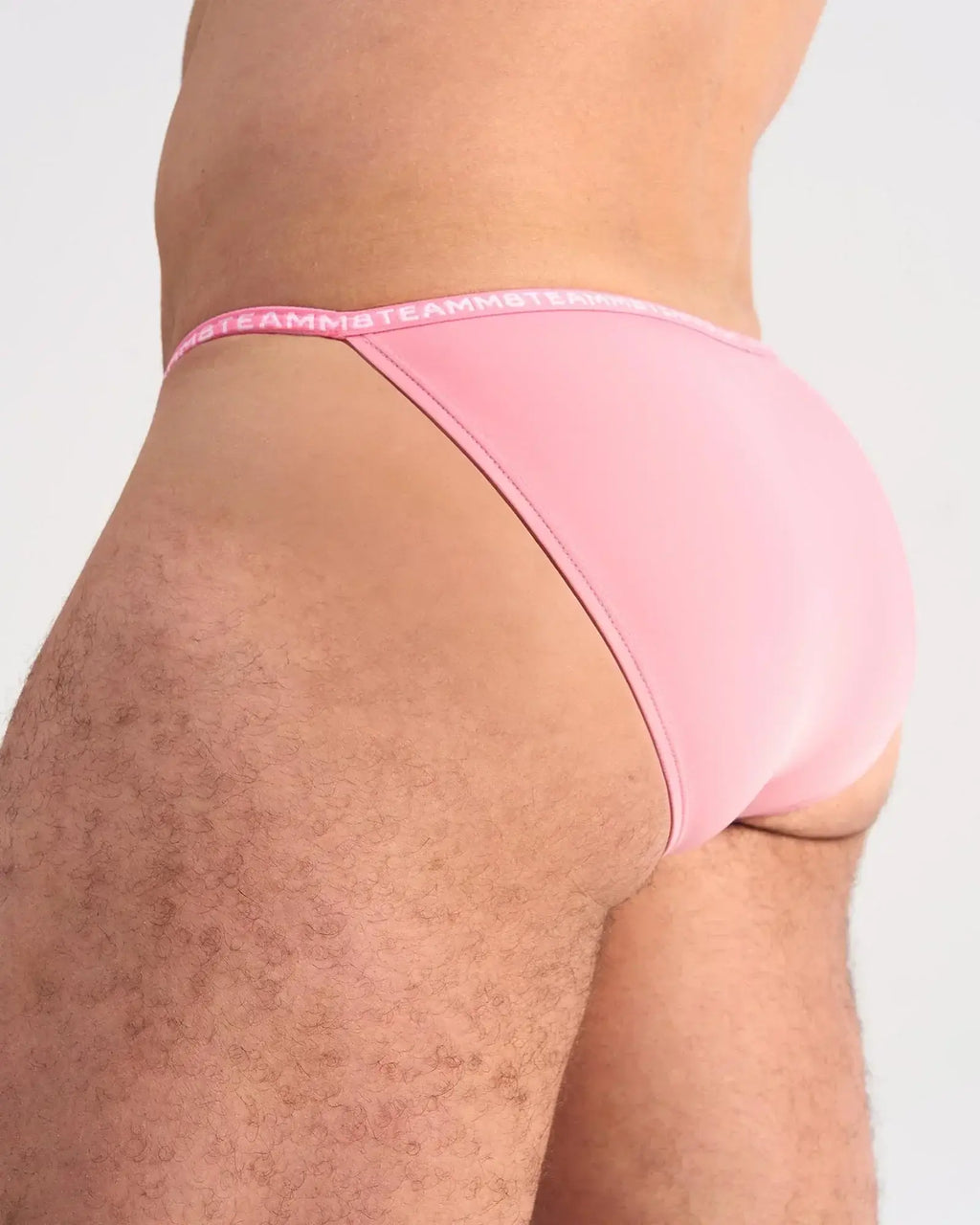 Pink glide micro brief with matching elastic waistband featuring the brand’s logo for comfortable support