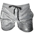 Shiny silver glitter booty shorts with star patterns and a black drawstring waistband for stylish wear