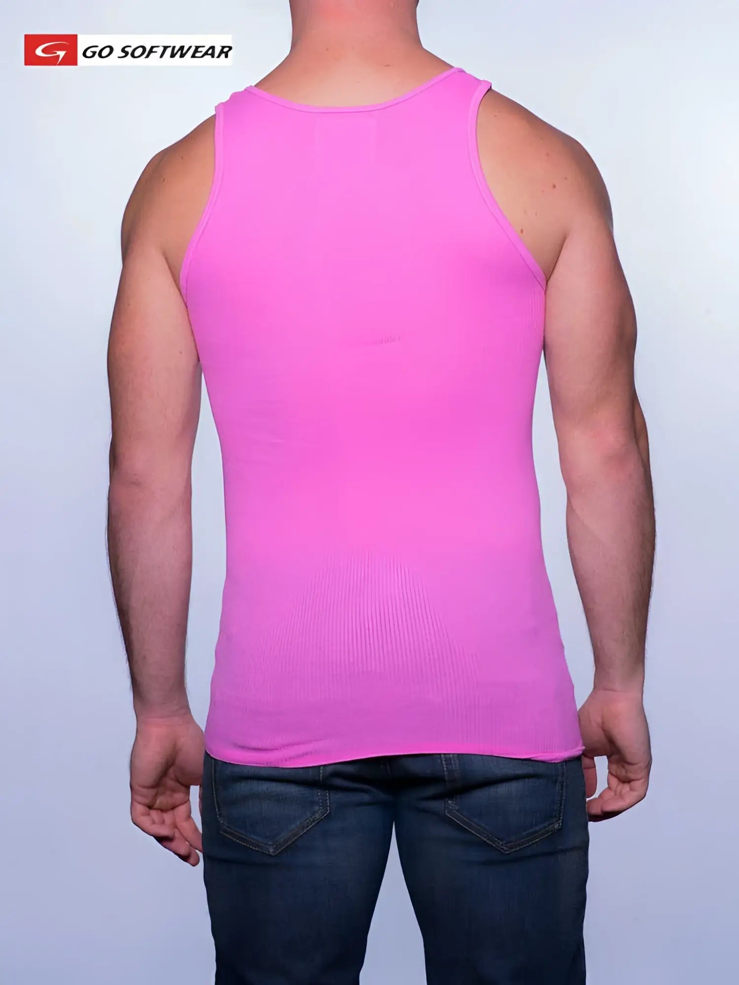 A vibrant deep pink ribbed tank top from Go Softwear made of soft material in size small