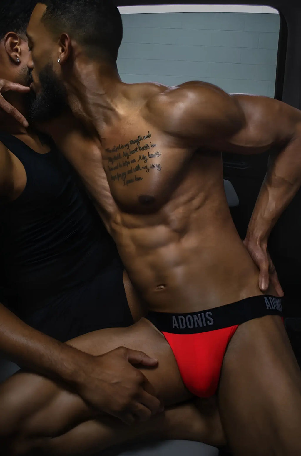 Red adonis goji berry night cap jock-thong briefs with black waistband shown from the back
